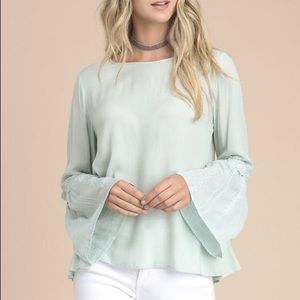 Embroidered bell sleeve top